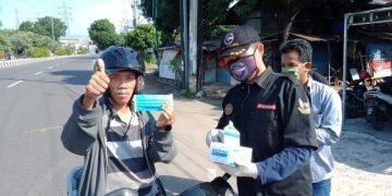 Forkoci Bagikan 25 Ribu Masker Gratis Kepada Pengendara