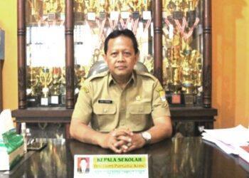 DRS. Herri Purnama, Kons – Kepala Sekolah SMPN 1 Sumber