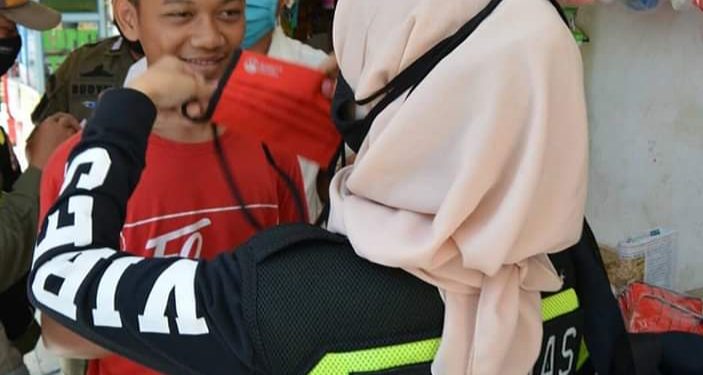 Aturan Sanksi Tidak Pakai Masker Belum Turun