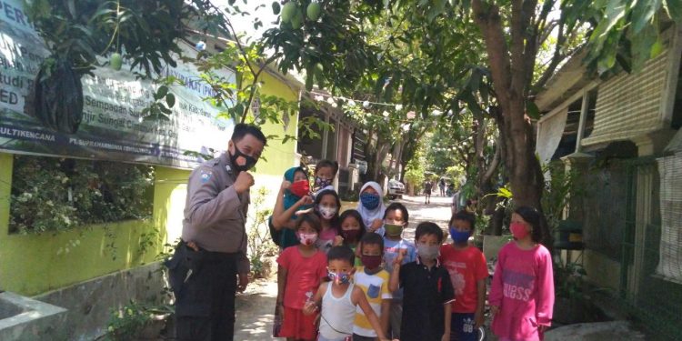 Bhabinkamtibmas Desa Pamengkang, Gencar Sosialisasikan Protokol Kesehatan