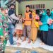 Pemdes Mekarsari Bagikan Ribuan Masker Kepada Warga