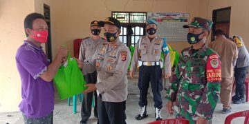 Penggali Kubur Diberi Bantuan Beras