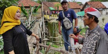 Een Bantu Pembangunan Jembatan Sumur Wuni