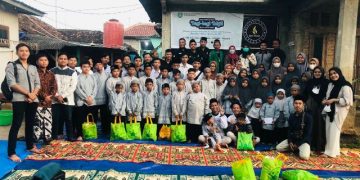 IKMI Santuni Anak Yatim Desa Mundakjaya