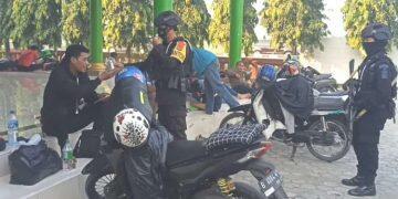 Batalyon C Pelopor Satbrimob Polda Jabar Bagikan Ratusan Handsanitizer kepada Pemudik