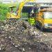 Terjunkan Alat Berat, DLH Bersihkan Sampah di TPSS Desa Setupatok
